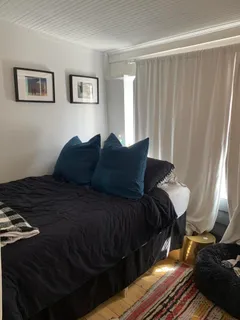 a kitchen with cabinets appliances and a sink