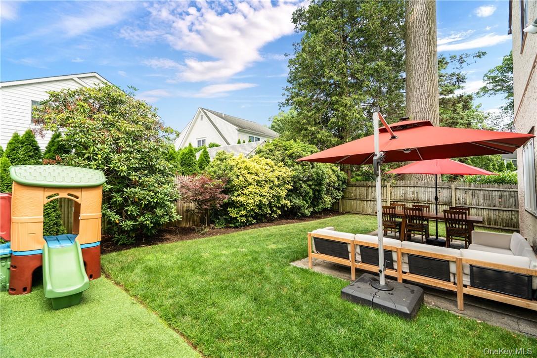 19 Hamilton Road Scarsdale, NY 10583 - Photo 19 of 22 The yard includes a section with artificial turf for playing