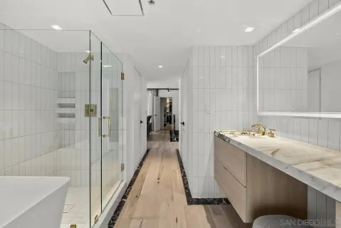a close view of a utility room with dryer and washer