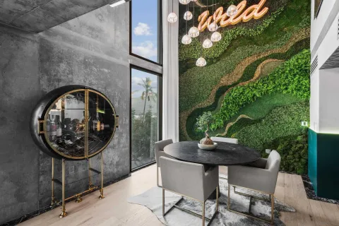 a picture of a table and chairs in front of a door