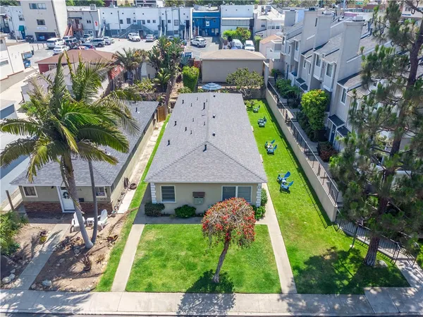 a aerial view of a house with a garden and plants