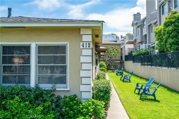 a view of a swimming pool with a lounge chairs