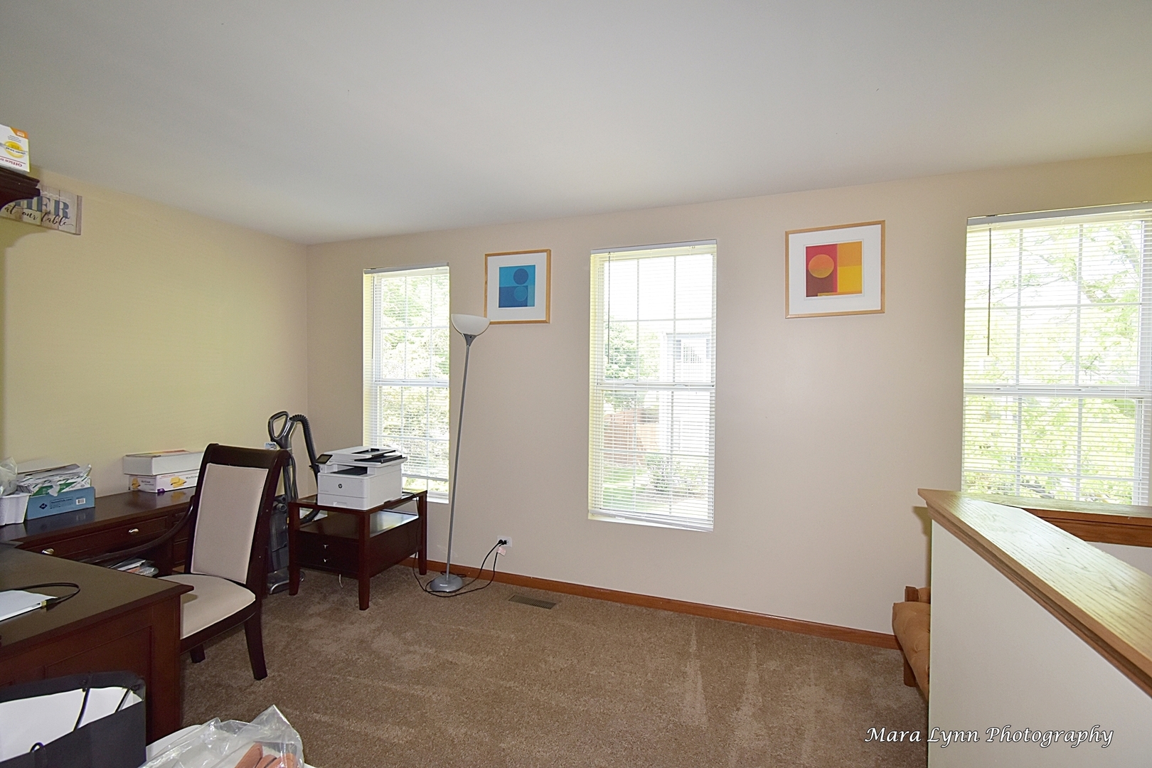 987 Symphony Drive Aurora, IL 60504 - Photo 14 of 27 a view of workspace with wooden floor and windows