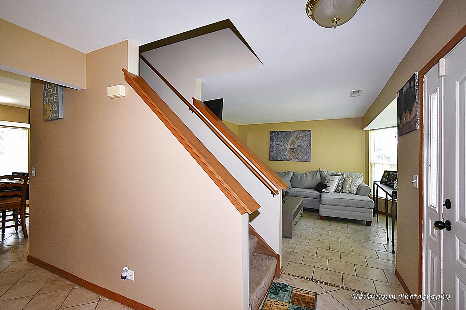 987 Symphony Drive Aurora, IL 60504 - Photo 3 of 27 a living room with furniture and a floor to ceiling window