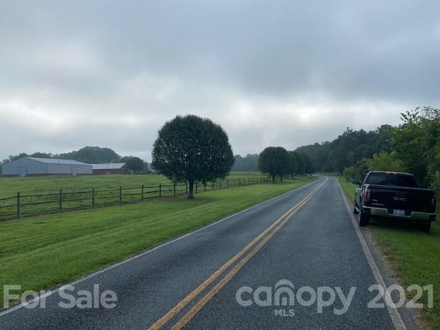 610 Bruce Thomas Road Monroe, NC 28112 - Photo 7 of 8 a view of a street with a big yard