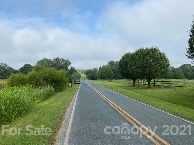 610 Bruce Thomas Road Monroe, NC 28112 - Photo 8 of 8 a view of a street with a big yard