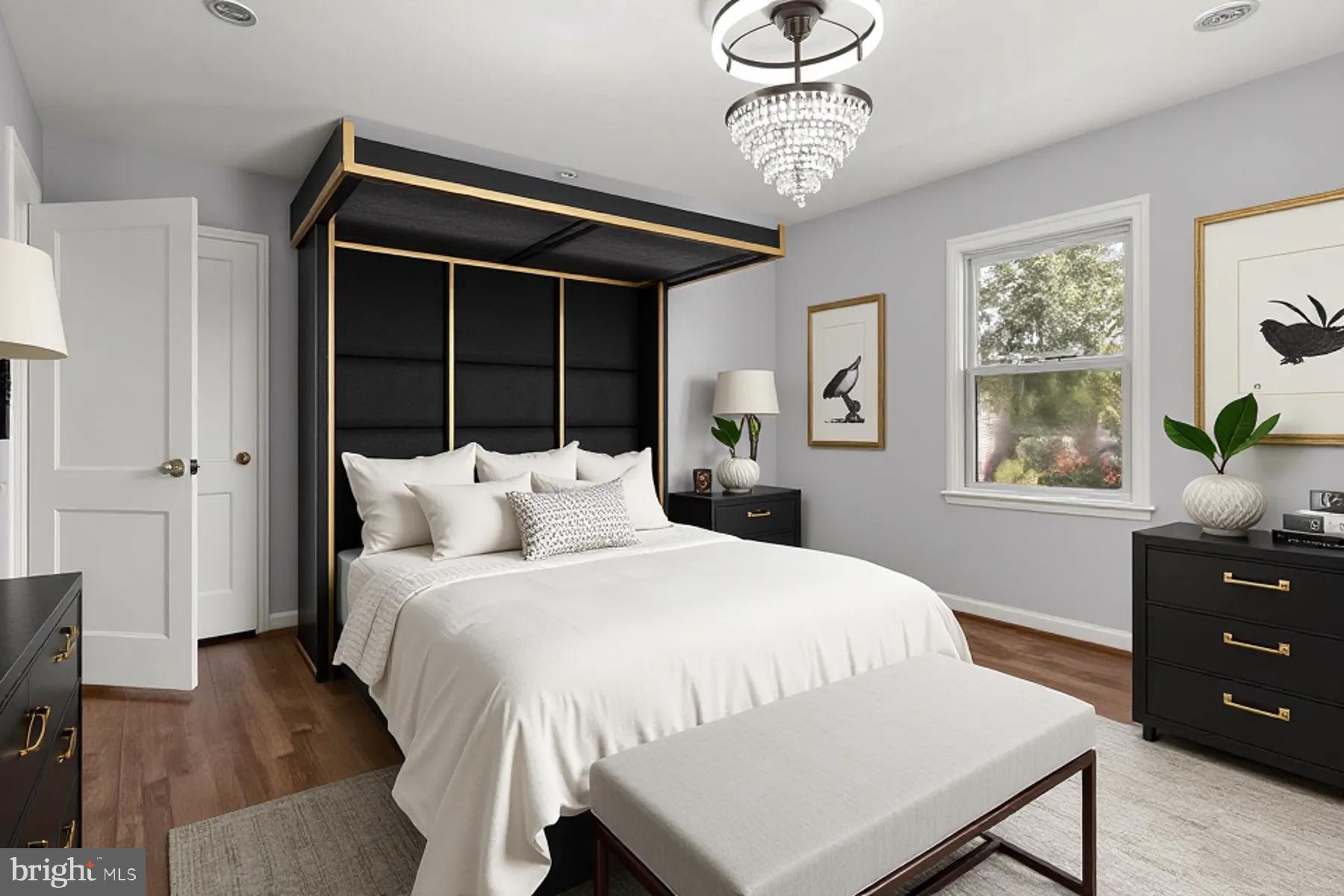 6806 10th Avenue Takoma Park, MD 20912 - Photo 21 of 39 a bedroom with a bed and a window