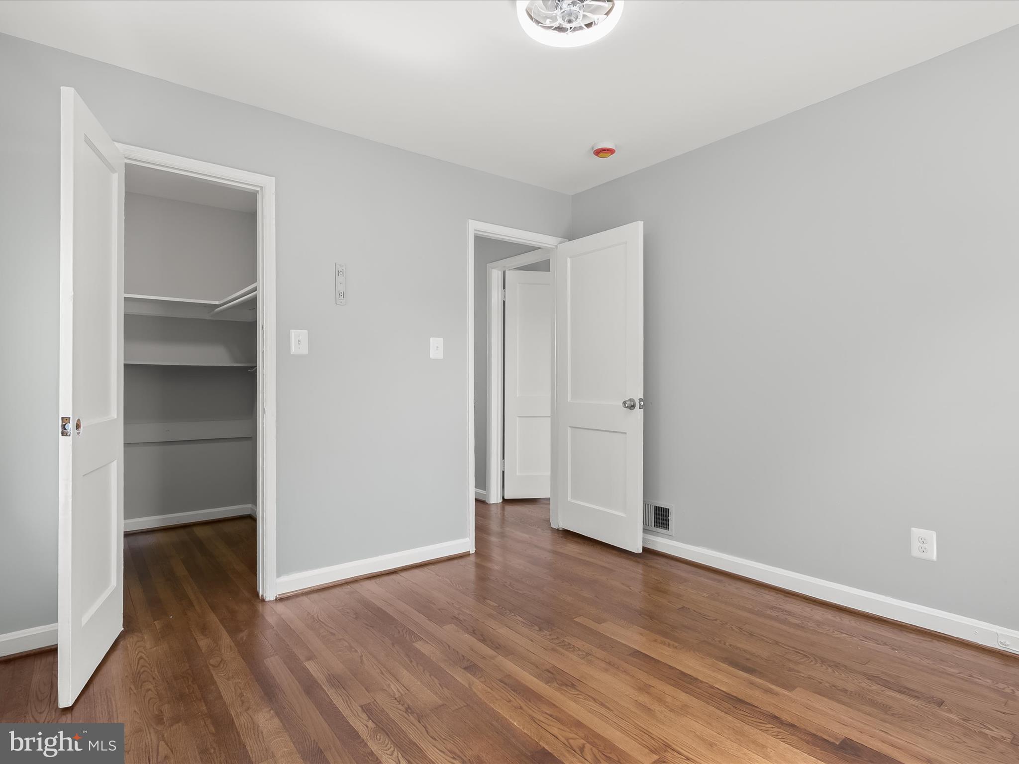 6806 10th Avenue Takoma Park, MD 20912 - Photo 31 of 39 a view of empty room with wooden floor