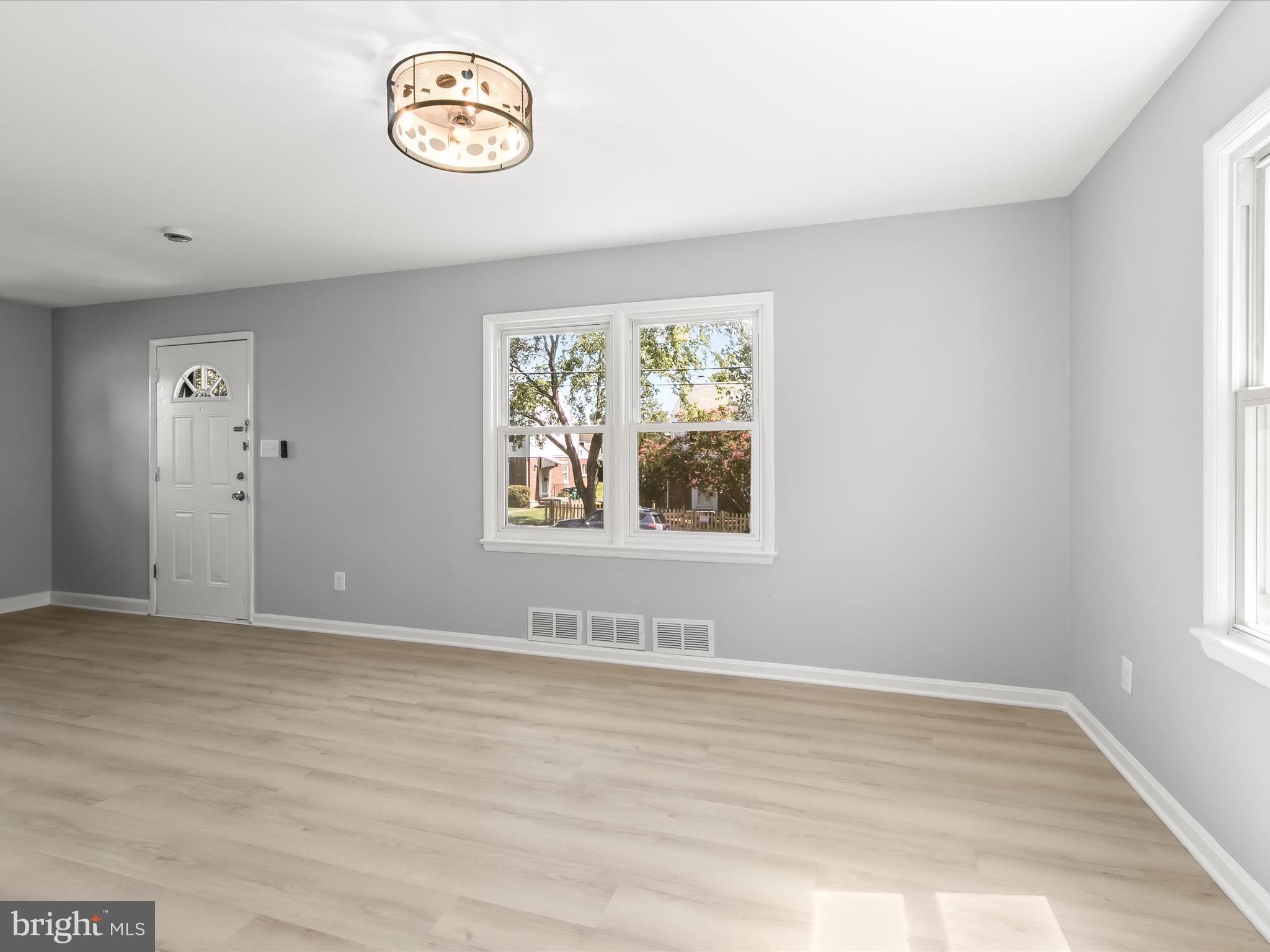 6806 10th Avenue Takoma Park, MD 20912 - Photo 9 of 39 an empty room with windows