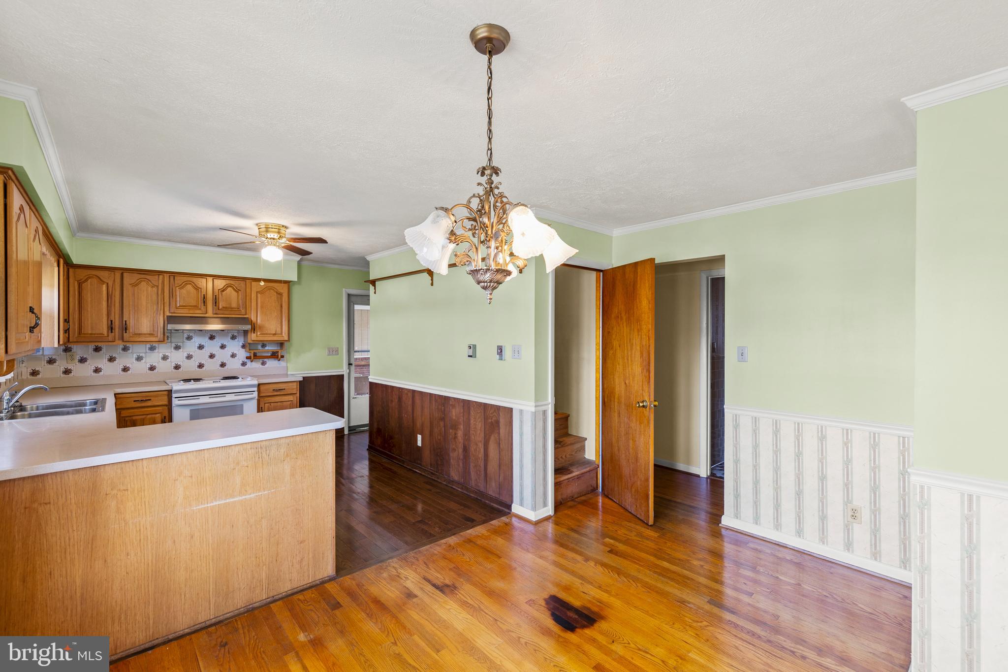 204 Ridge Road Winchester, VA 22602 - Photo 11 of 51 a view of a dining room with furniture window and wooden floor