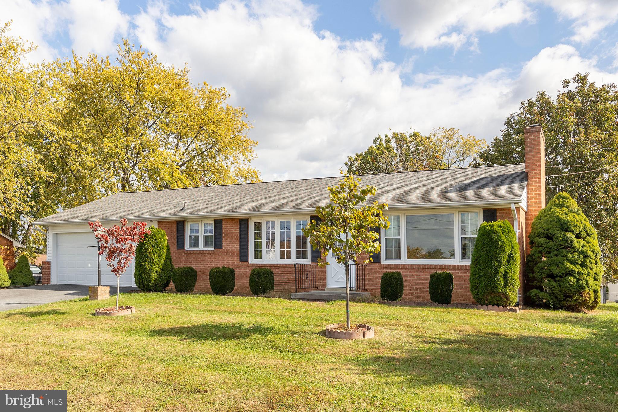 204 Ridge Road Winchester, VA 22602 - Photo 2 of 51 a house view with swimming pool in front of it