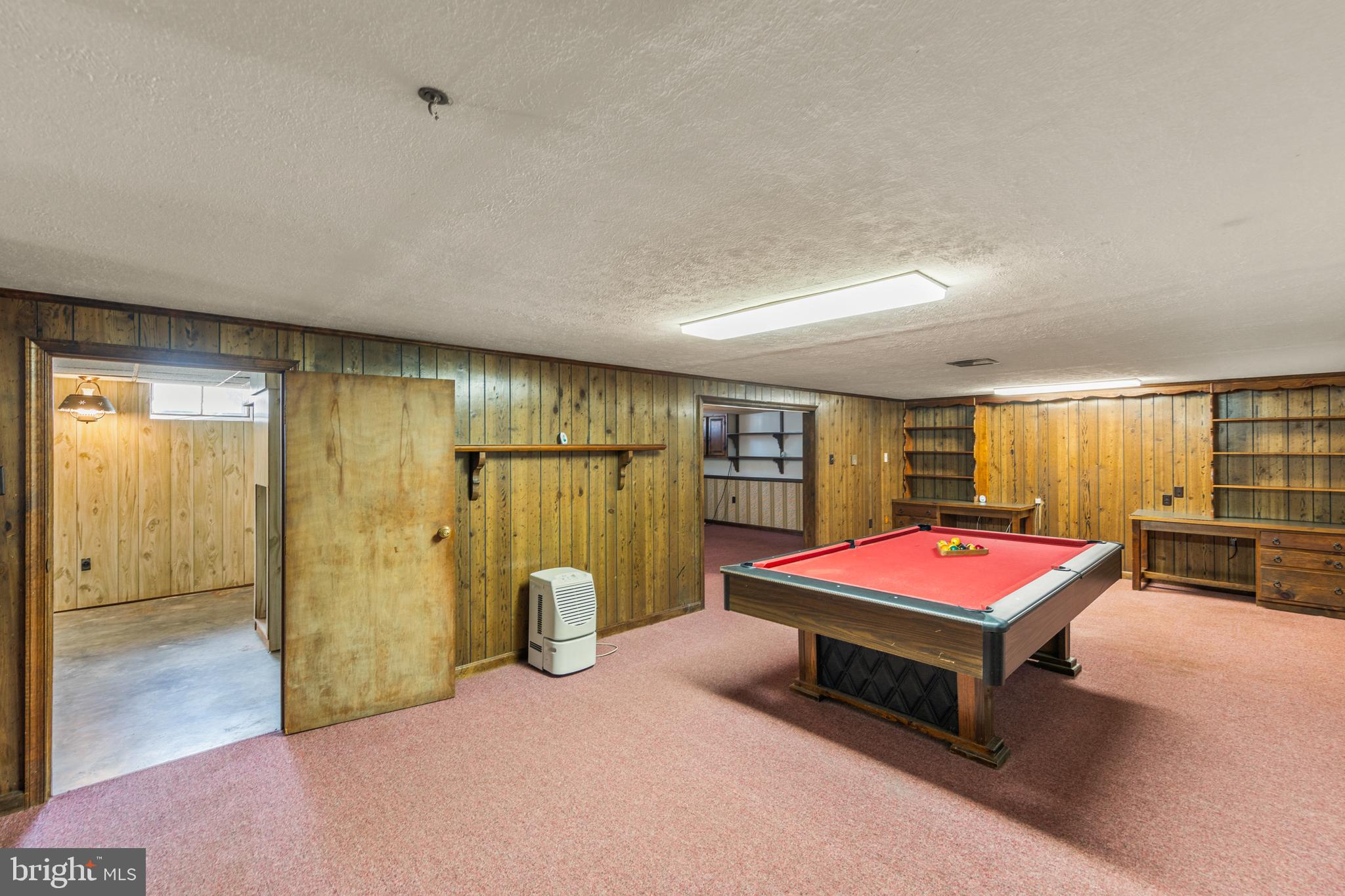 204 Ridge Road Winchester, VA 22602 - Photo 28 of 51 a bedroom with a bed and a table