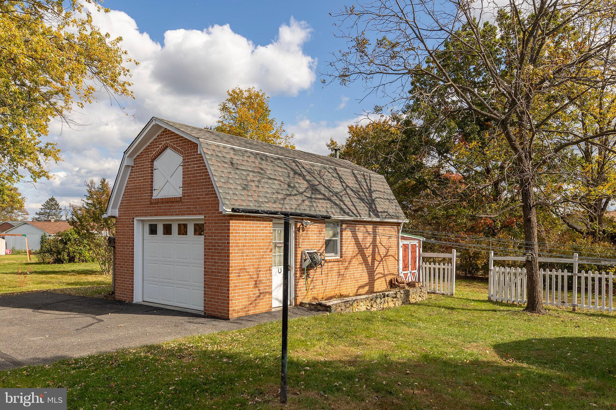 204 Ridge Road Winchester, VA 22602 - Photo 44 of 51 a backyard of a house with table and chairs
