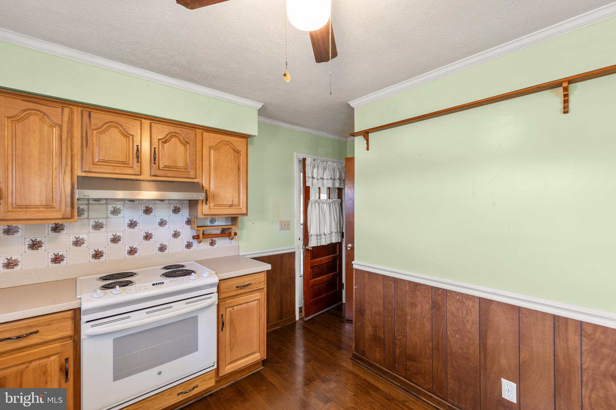 204 Ridge Road Winchester, VA 22602 - Photo 8 of 51 a kitchen with stainless steel appliances a stove a sink and a refrigerator