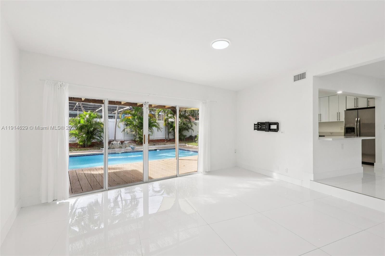 12630 Northeast Miami Place North Miami, FL 33161 - Photo 22 of 66 a view of an empty room with a window