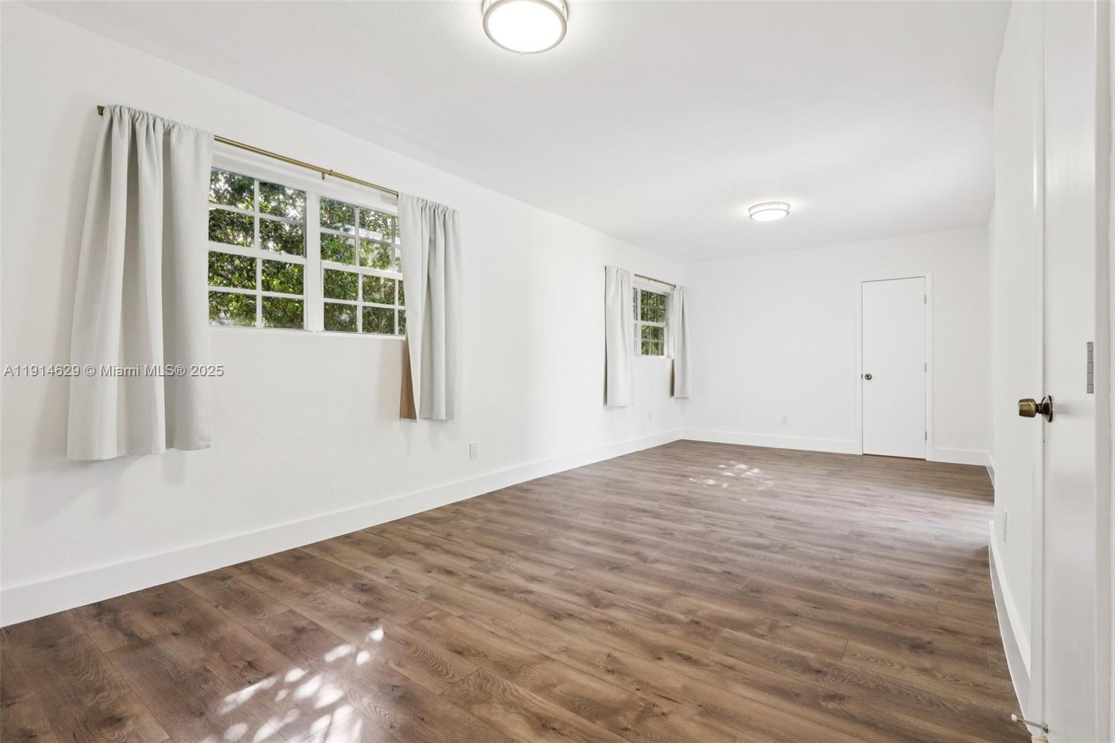 12630 Northeast Miami Place North Miami, FL 33161 - Photo 25 of 66 a view of empty room with windows