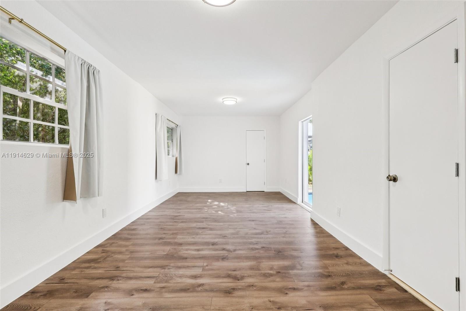 12630 Northeast Miami Place North Miami, FL 33161 - Photo 26 of 66 a view of an empty room and window