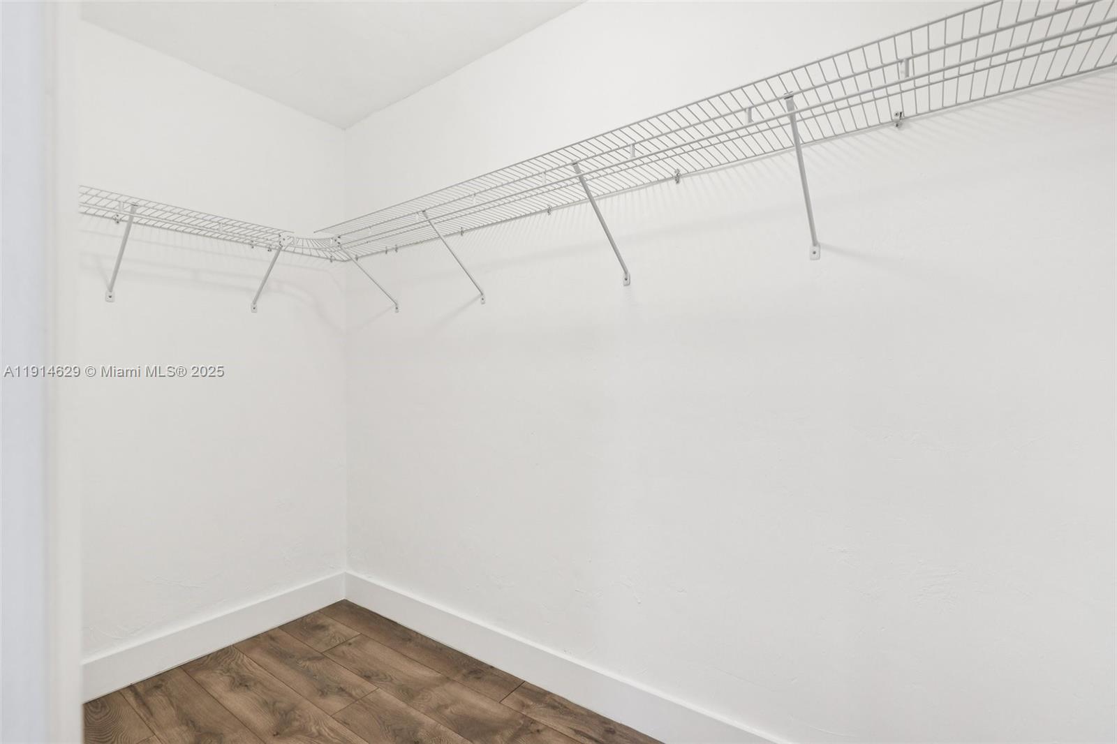 12630 Northeast Miami Place North Miami, FL 33161 - Photo 32 of 66 a view of a room with racks on the wall