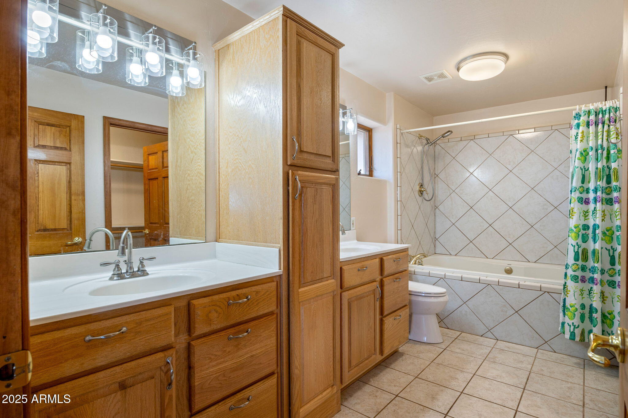 800 Arena Estates Taylor, AZ 85939 - Photo 24 of 50 a bathroom with a double vanity sink toilet and shower