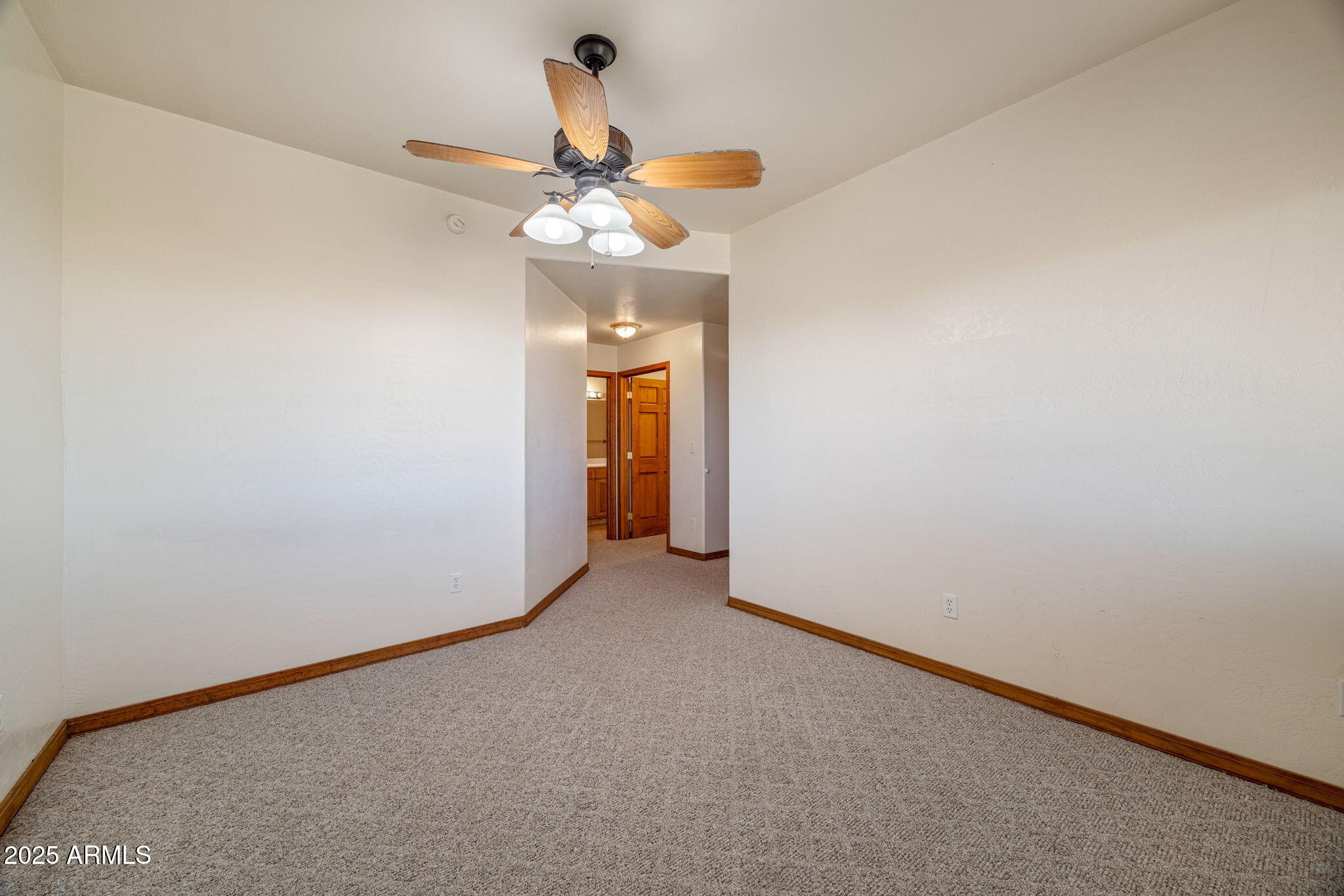 800 Arena Estates Taylor, AZ 85939 - Photo 36 of 50 a view of a livingroom with a chandelier fan and a chandelier