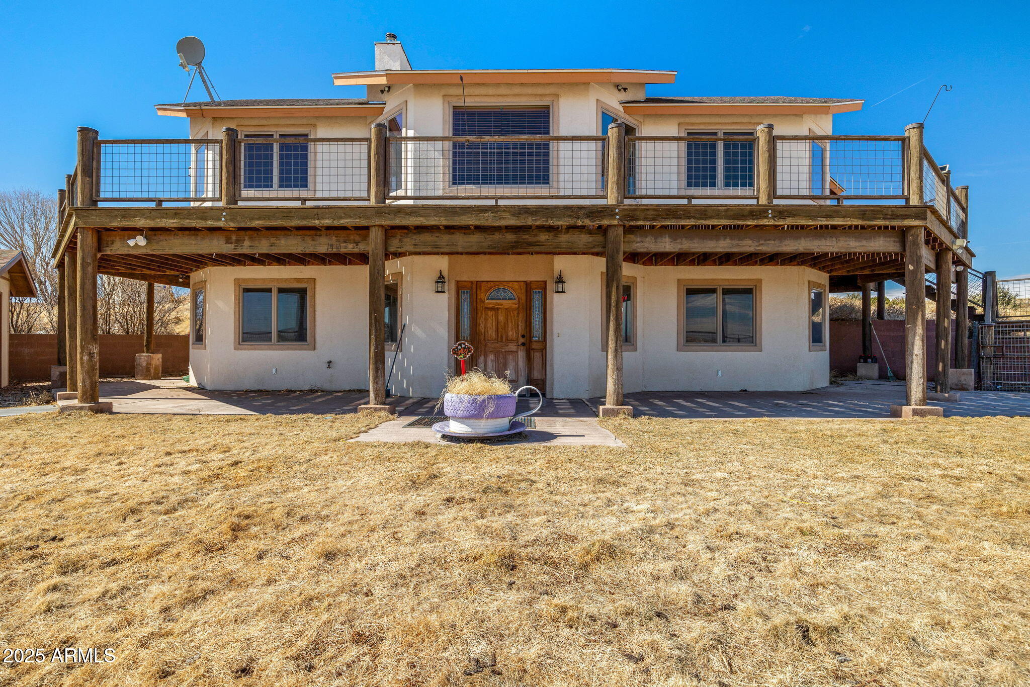 800 Arena Estates Taylor, AZ 85939 - Photo 8 of 50 a view of a house with large windows