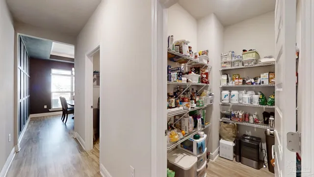 a bathroom with sink a bathtub and next to a window