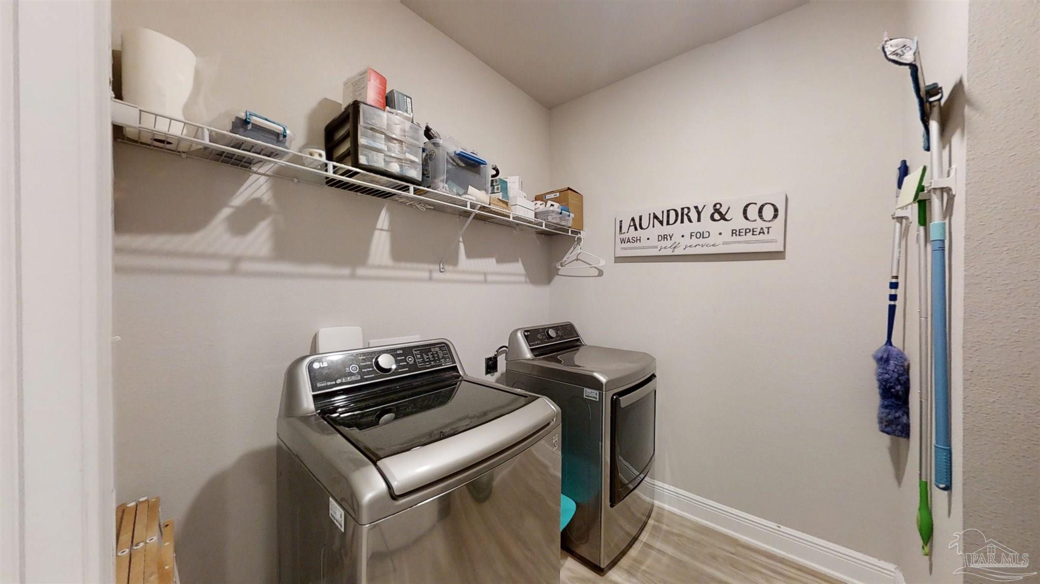 421 Apollo Avenue Gulf Shores, AL 36542 - Photo 27 of 72 a close view of a storage and utility room with racks on the wall