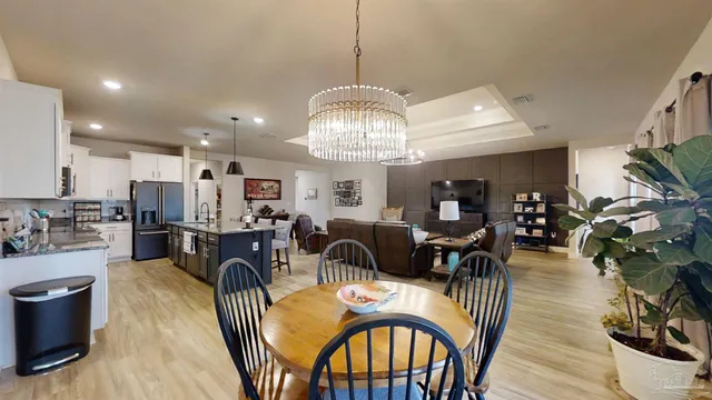 a bedroom with a bed and a lamp