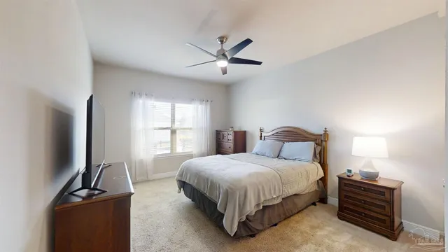 an aerial view of a building with parking