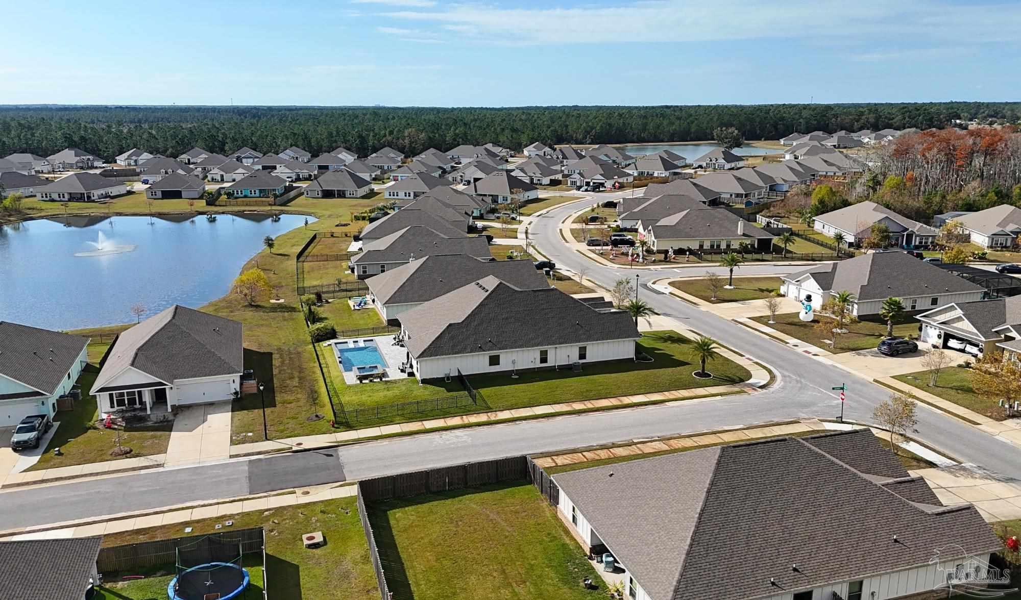 421 Apollo Avenue Gulf Shores, AL 36542 - Photo 57 of 72 an aerial view of a house with a swimming pool
