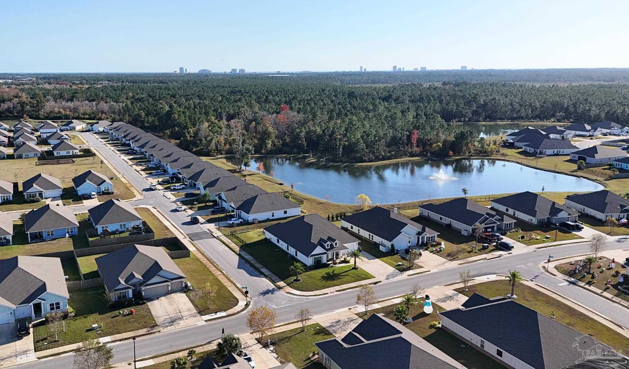 421 Apollo Avenue Gulf Shores, AL 36542 - Photo 59 of 72 an aerial view of a house with a lake view