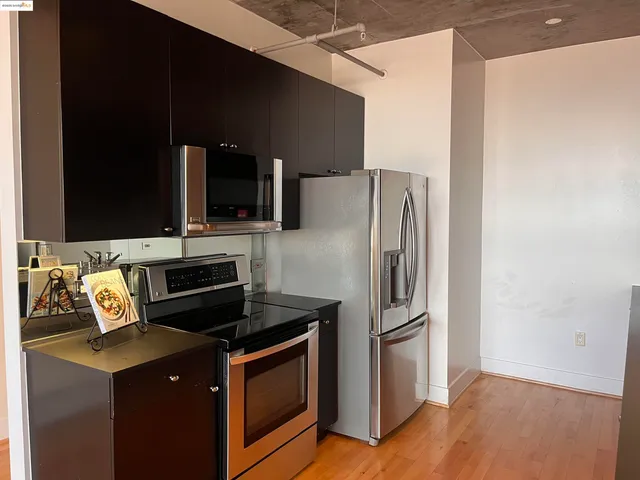 a kitchen with a sink and an oven
