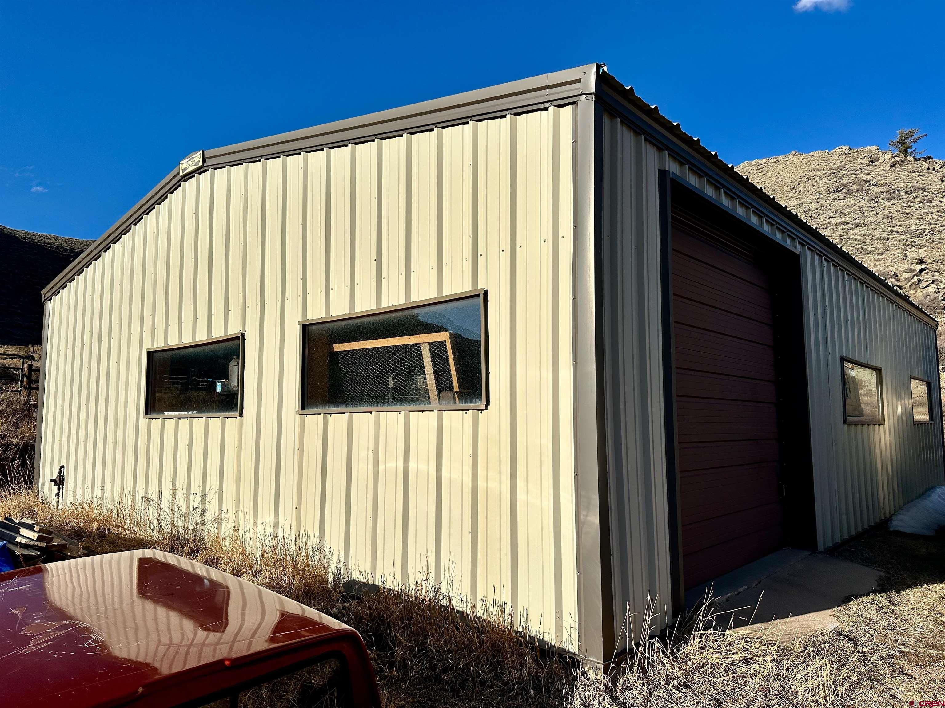 9437 County Road 76 Ohio City, CO 81239 - Photo 16 of 29 a view of a balcony with furniture