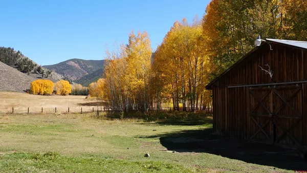a view of backyard with outdoor space