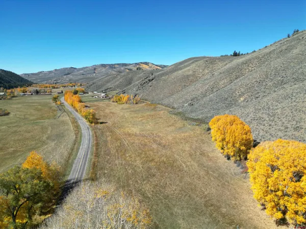 a view of ocean with a mountain