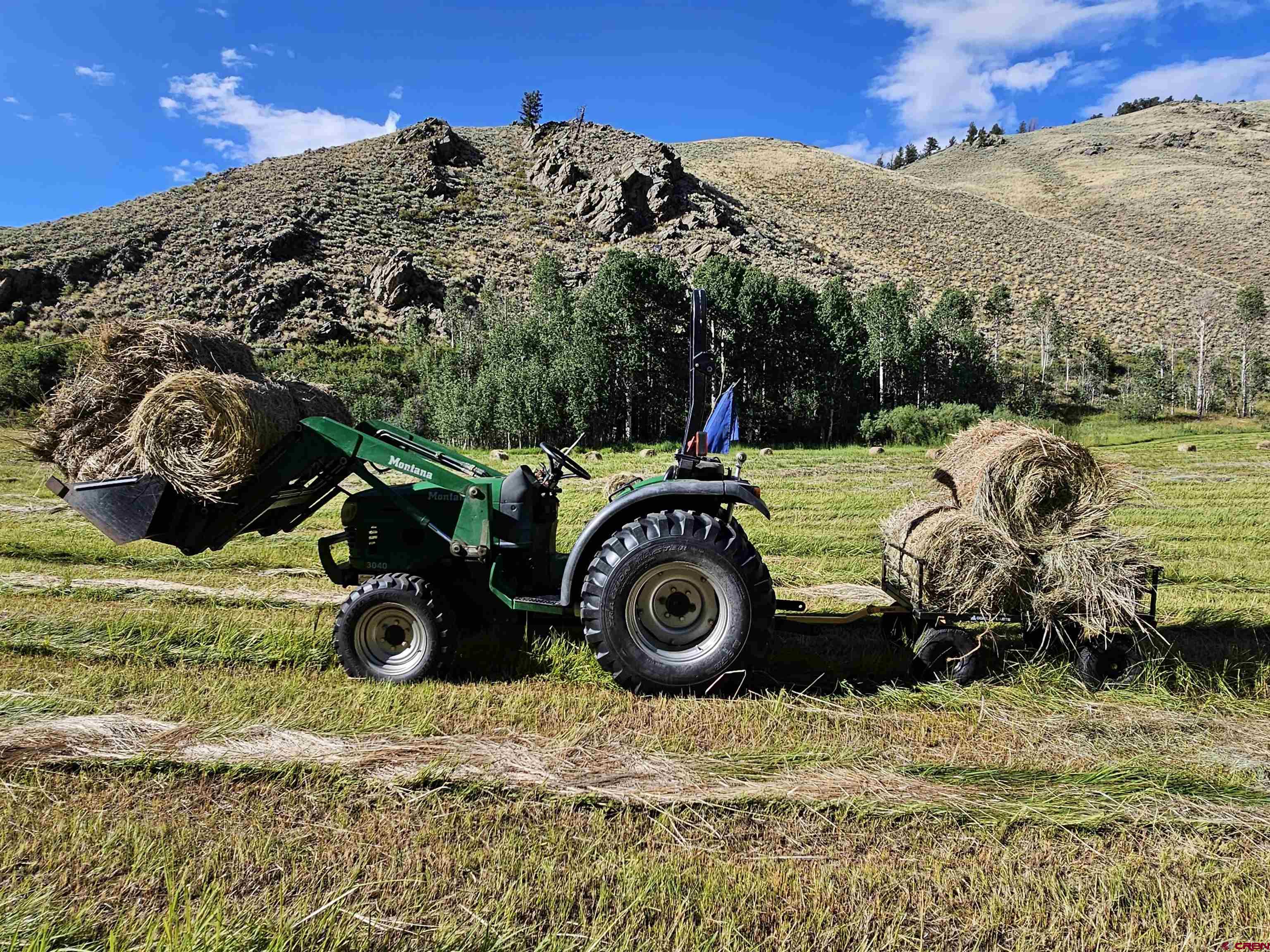 9437 County Road 76 Ohio City, CO 81239 - Photo 27 of 29 a view of a backyard with wooden fence