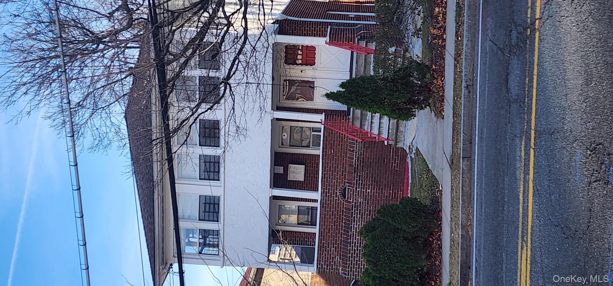 114 Lincoln Avenue New Rochelle, NY 10801 - Photo 2 of 27 Townhome / multi-family property with a porch