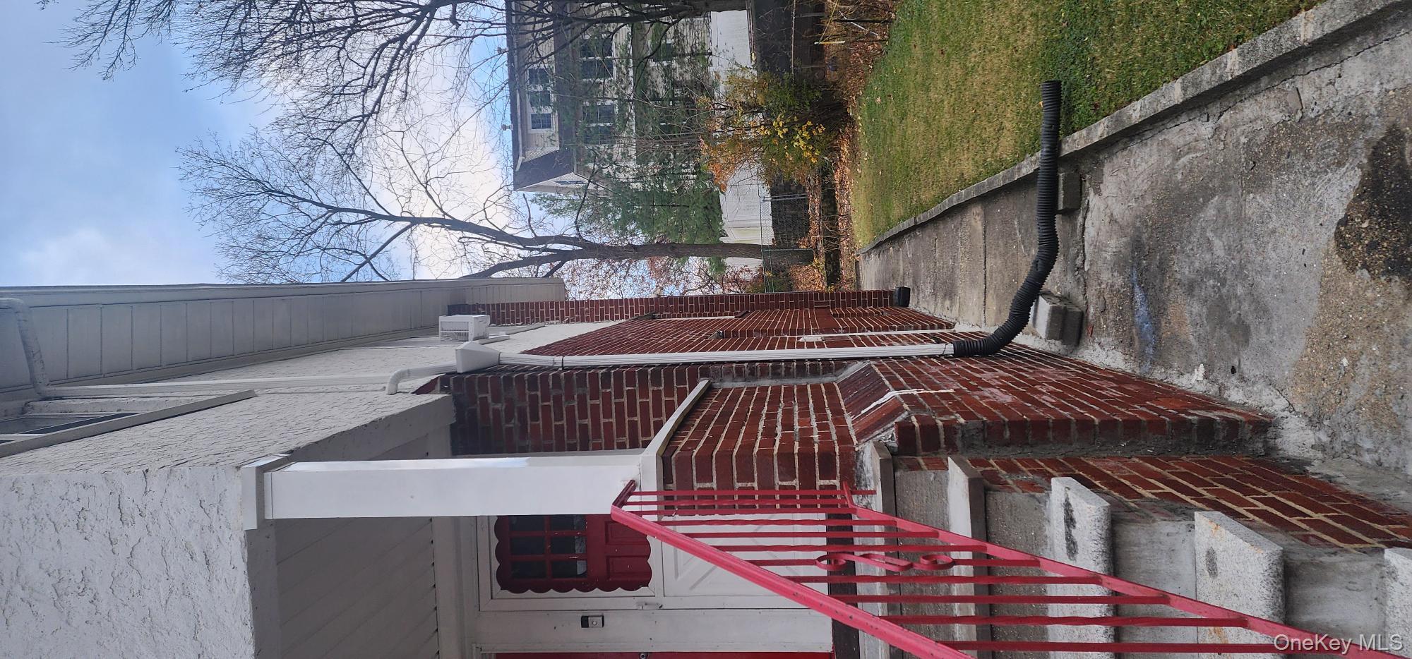 114 Lincoln Avenue New Rochelle, NY 10801 - Photo 23 of 27 View of property exterior featuring a yard