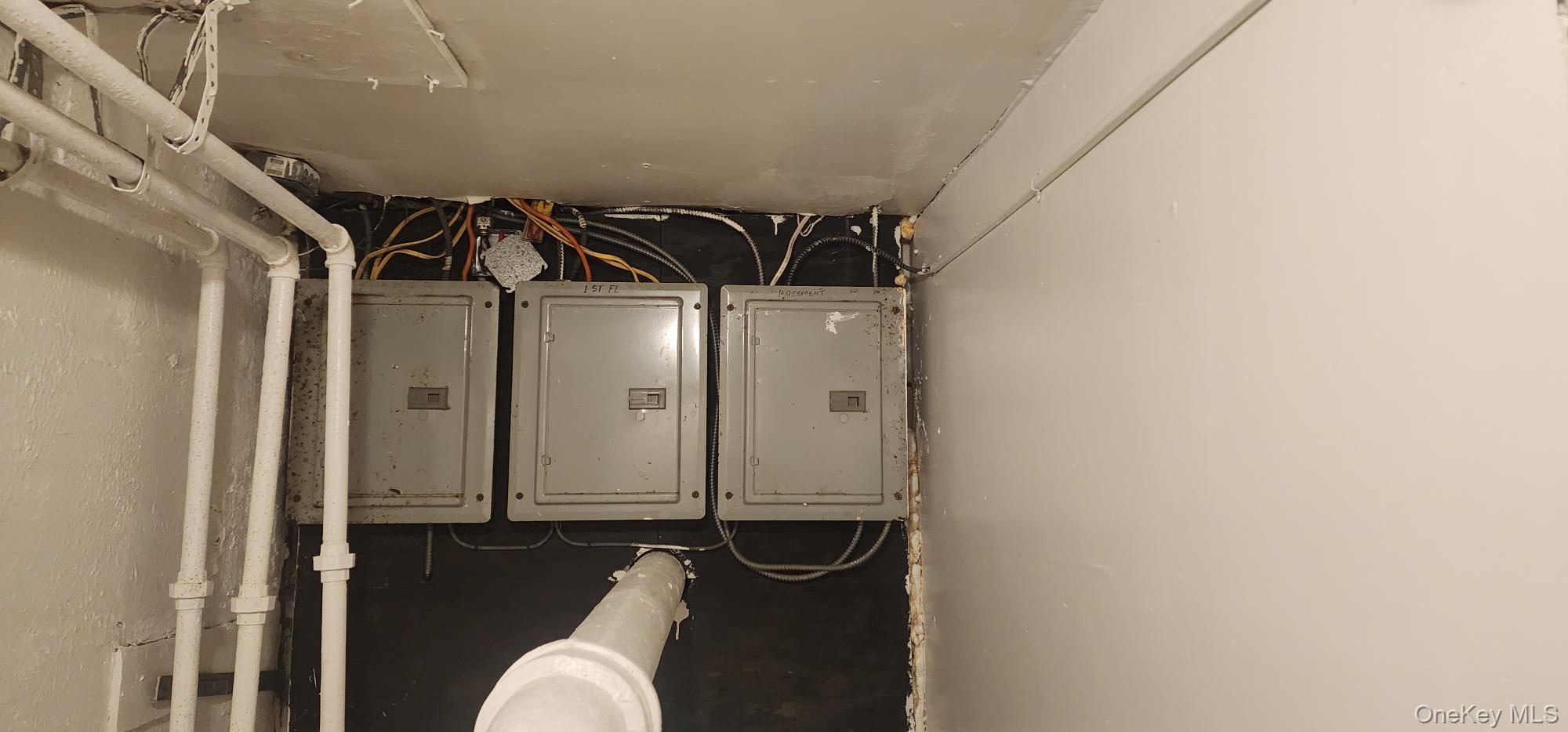 114 Lincoln Avenue New Rochelle, NY 10801 - Photo 24 of 27 Utility room featuring electric panel