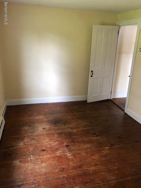 626 Salisbury Road Sheffield, MA 01257 - Photo 4 of 7 a view of room with wooden floor