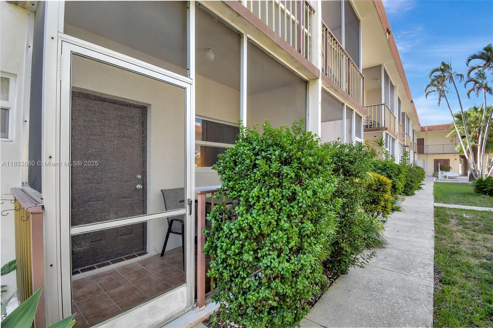 415 Northeast 2nd Street, Unit 124 Hallandale Beach, FL 33009 - Photo 35 of 36 a view of a entrance gate of the house