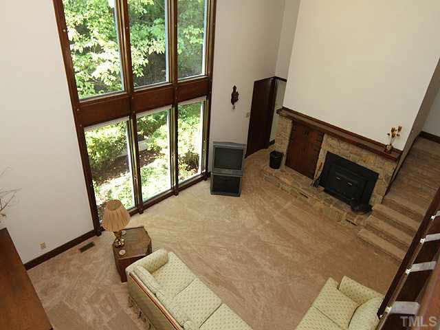 2713 Sherborne Place Raleigh, NC 27612 - Photo 25 of 25 View from the loft. What a wonderful home and space. This floor plan is awesome, the home just needs your personal touches. Remember the big expensive upgrades are done. NEW HVAC and Flooring. Newer roof, all windows, and decks in 2010! Living Room