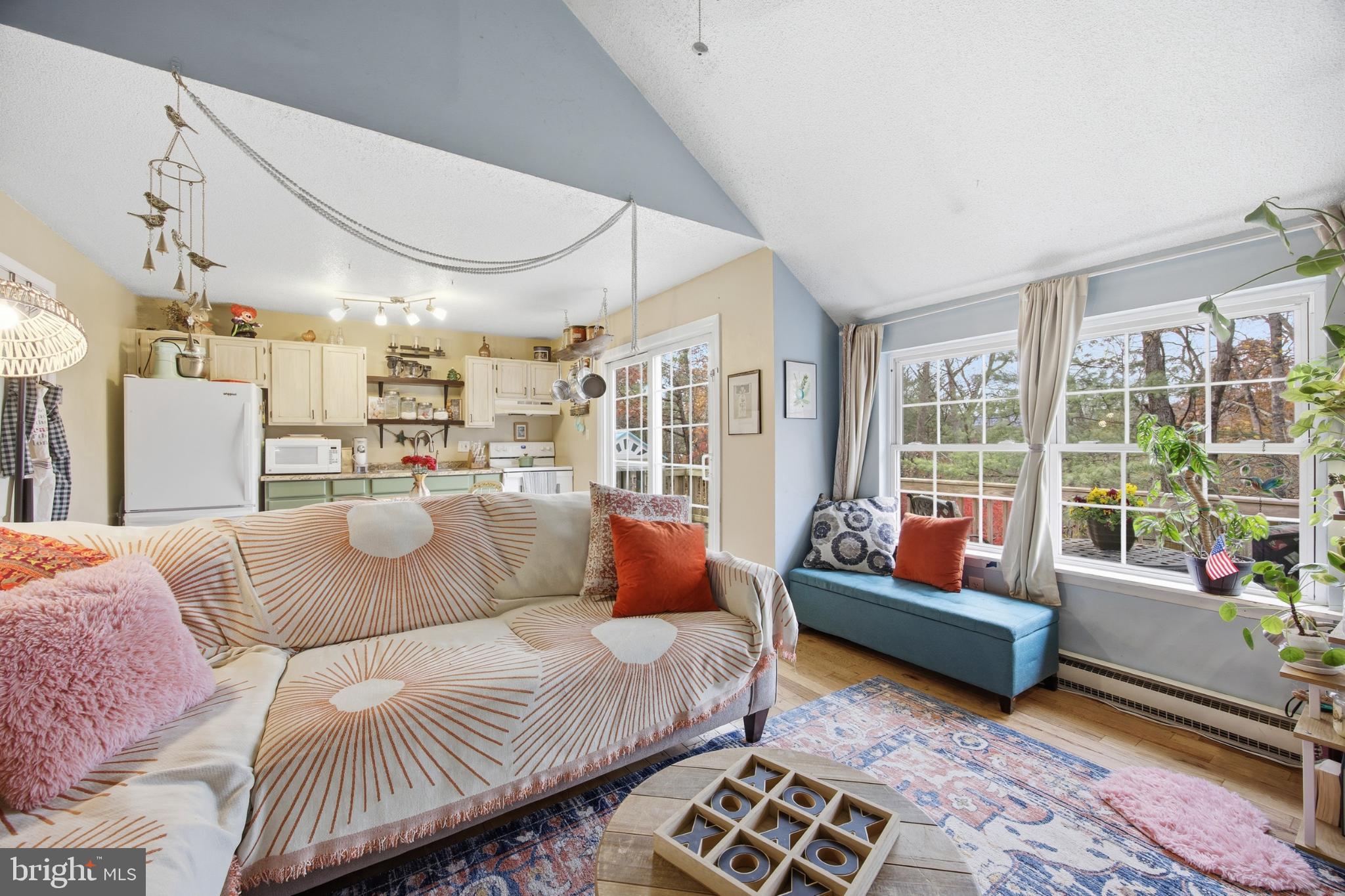 128 Hemlock Lane Gerrardstown, WV 25420 - Photo 22 of 44 a living room with furniture and a large window