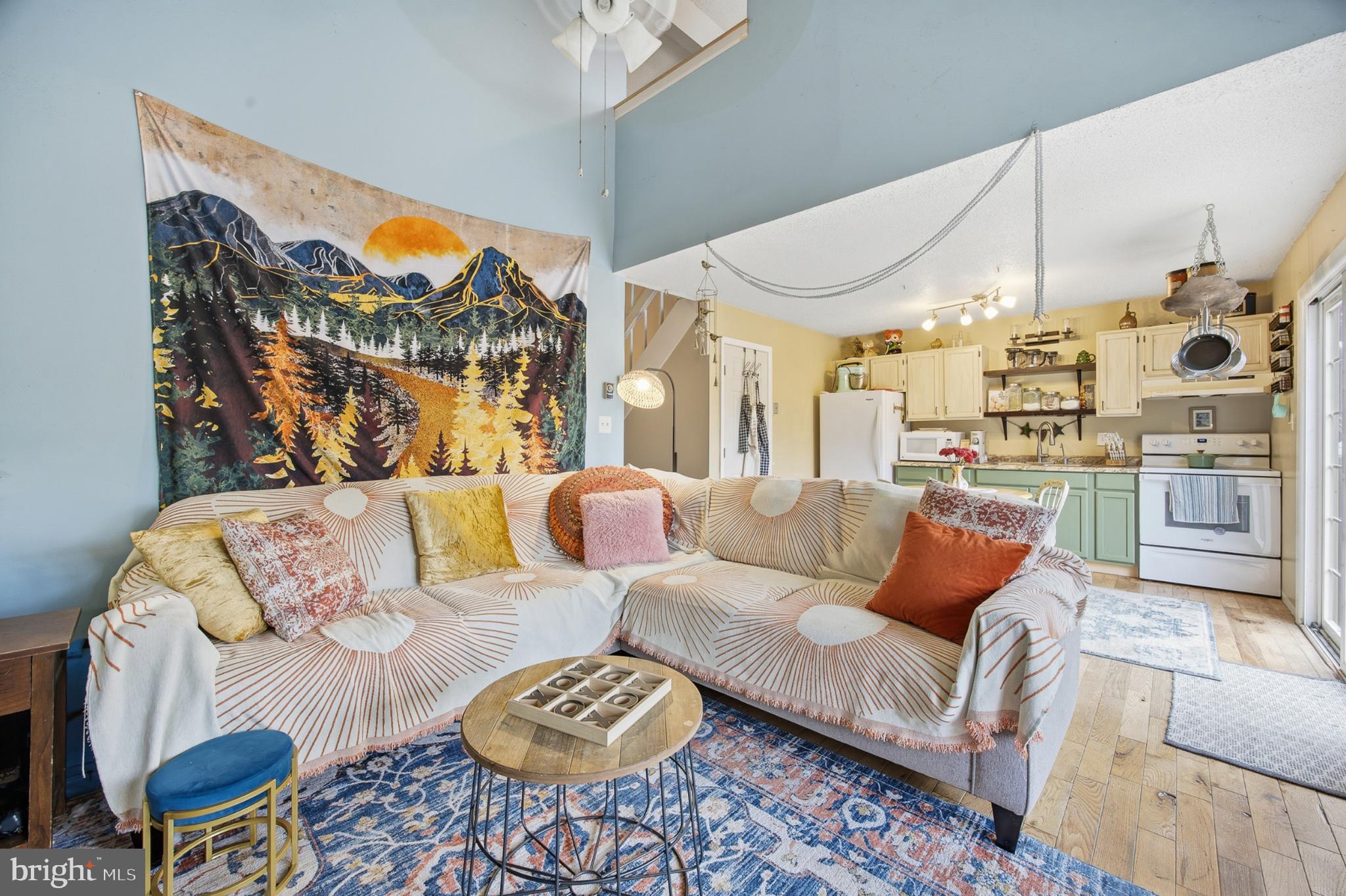 128 Hemlock Lane Gerrardstown, WV 25420 - Photo 23 of 44 a living room with furniture kitchen view and a table