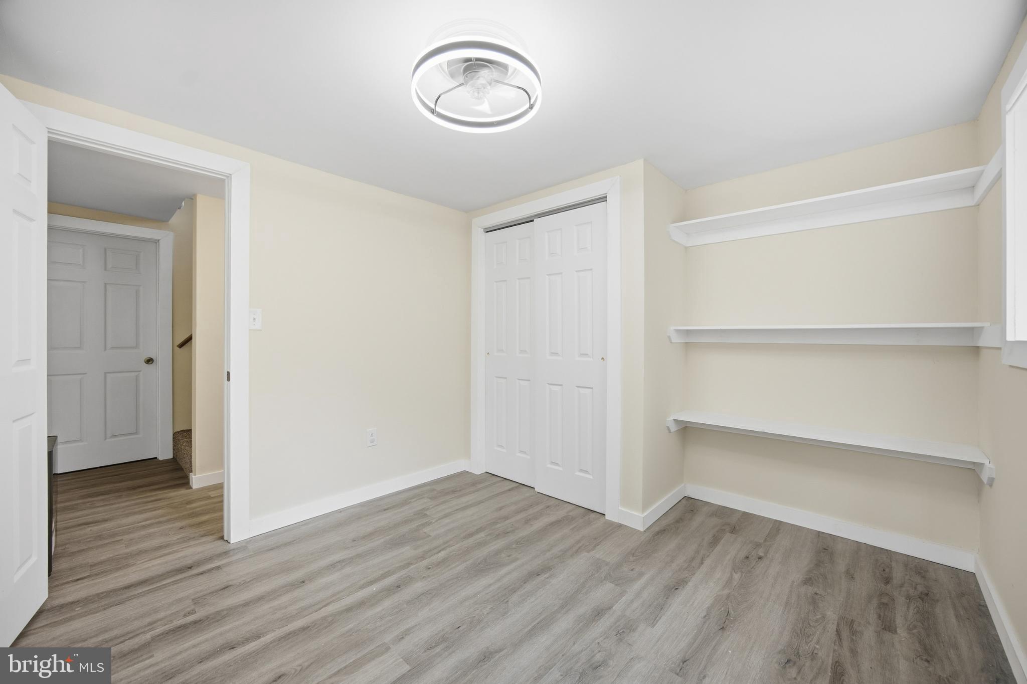 128 Hemlock Lane Gerrardstown, WV 25420 - Photo 27 of 44 a view of empty room with wooden floor