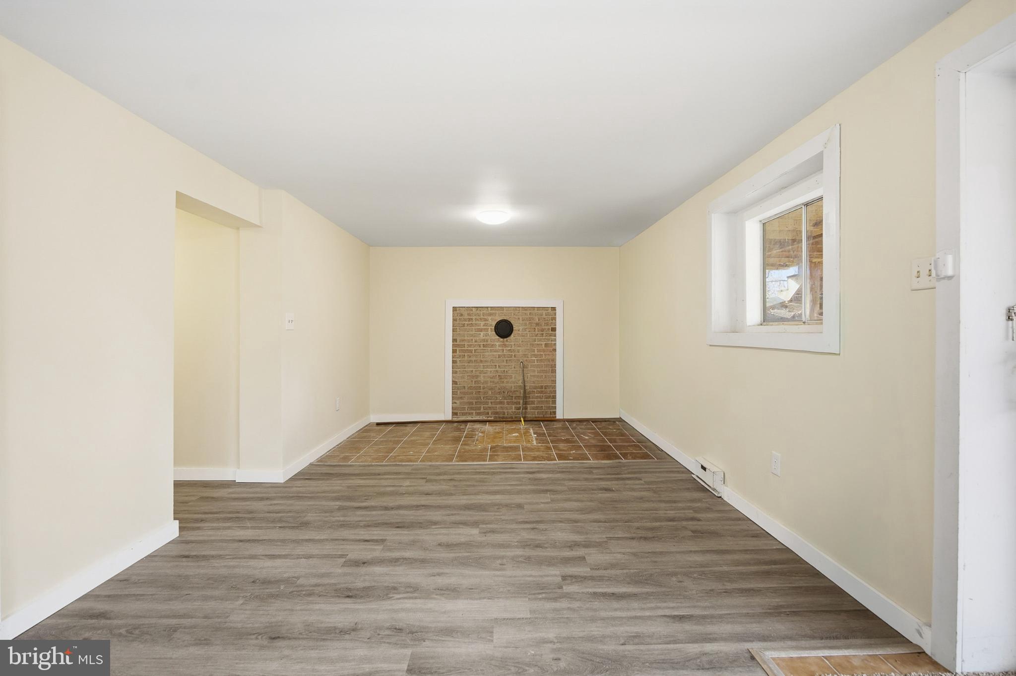 128 Hemlock Lane Gerrardstown, WV 25420 - Photo 28 of 44 a view of empty room with wooden floor