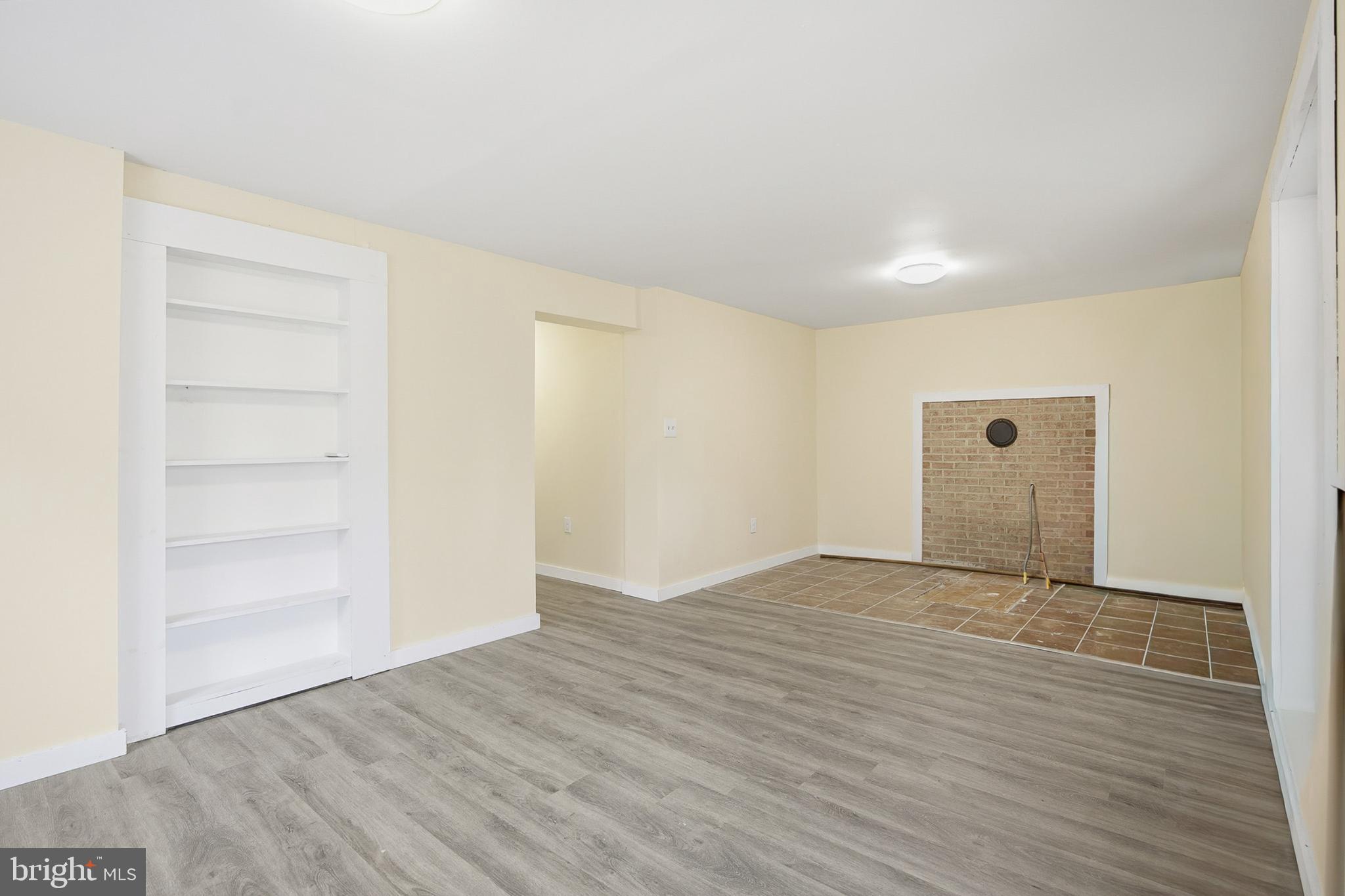 128 Hemlock Lane Gerrardstown, WV 25420 - Photo 30 of 44 a view of an empty room with wooden floor
