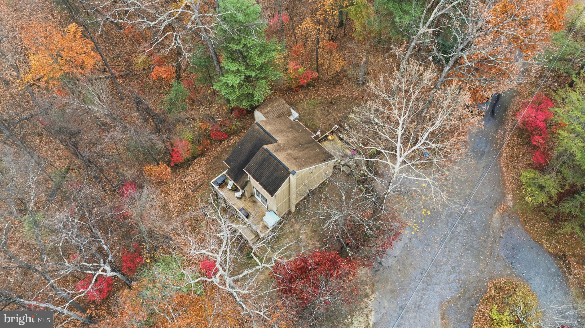 128 Hemlock Lane Gerrardstown, WV 25420 - Photo 35 of 44 an aerial view of a house with yard