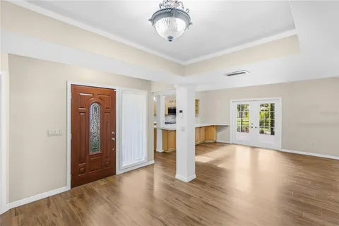 a view of a livingroom with furniture and wooden floor