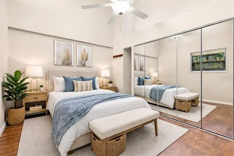 a bathroom with a glass shower door